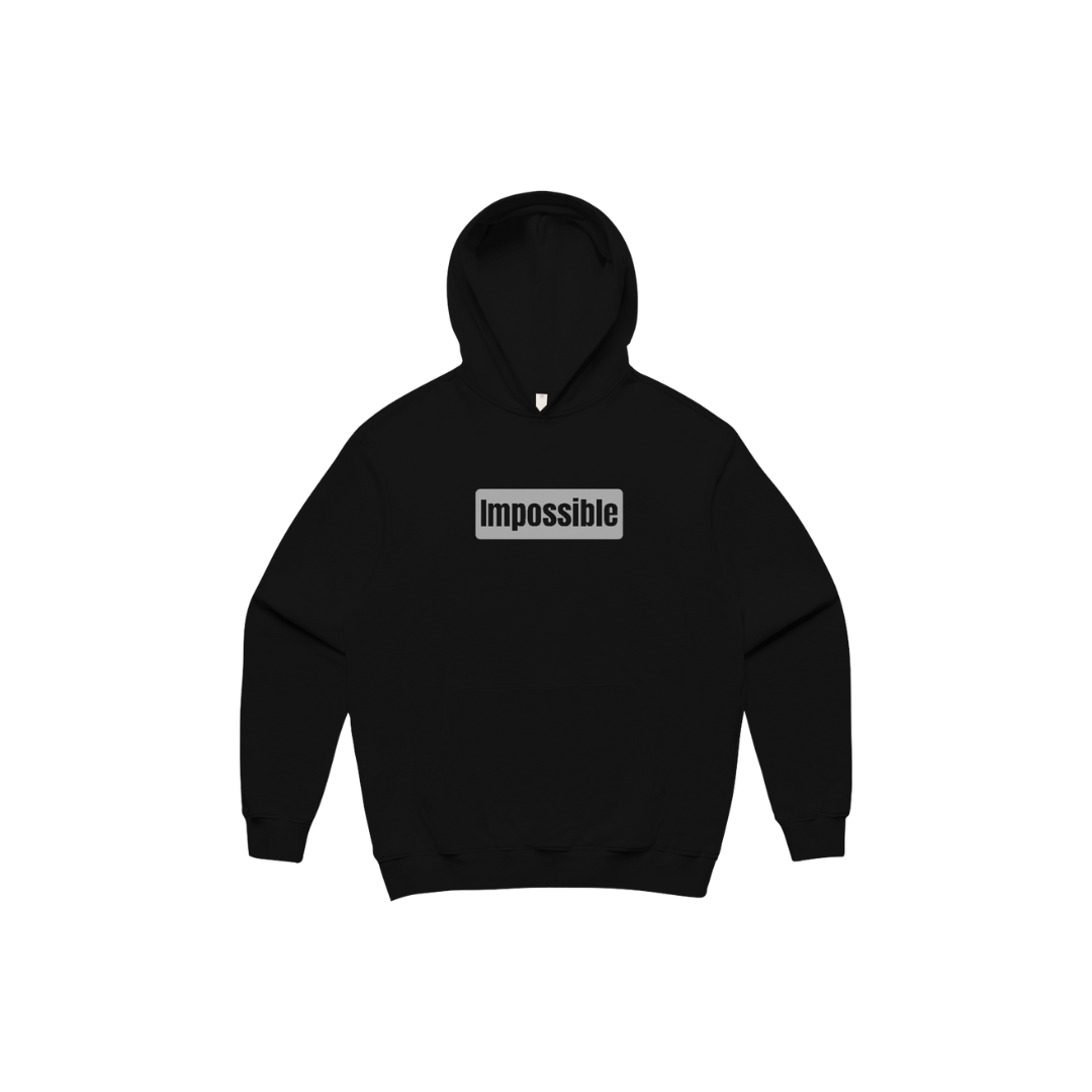 Black hoodie with 'Impossible' text on a white background