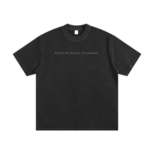 Black t-shirt with 'PRESSURE MAKES DIAMONDS' text with white letters