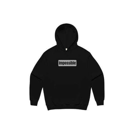 Black hoodie with 'Impossible' text on a white background